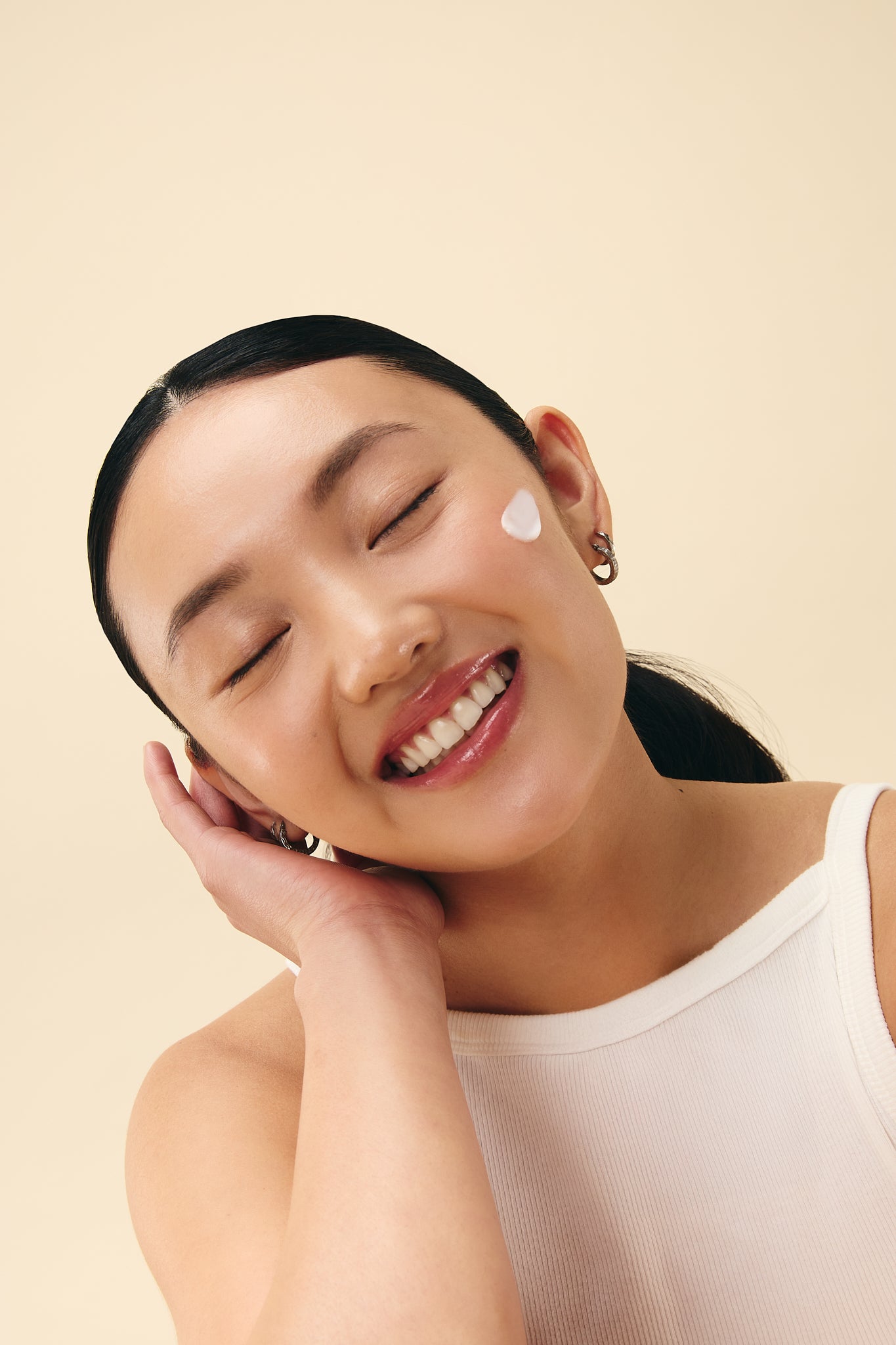 Woman applying Treats Lab for eczema prone skin