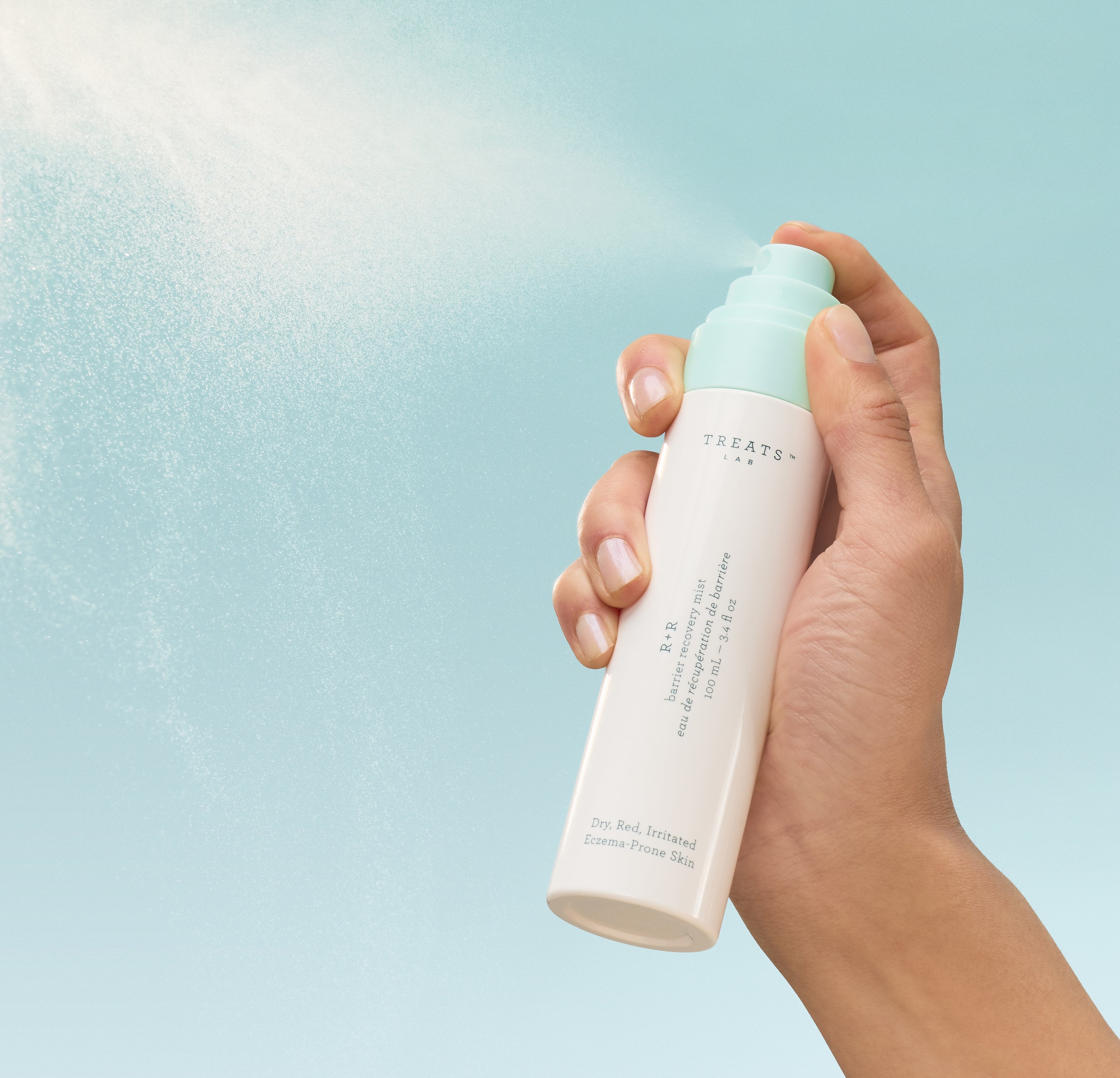 hand holding barrier repair skincare mist designed for skin barrier repair and supporting a consistent barrier repair routine